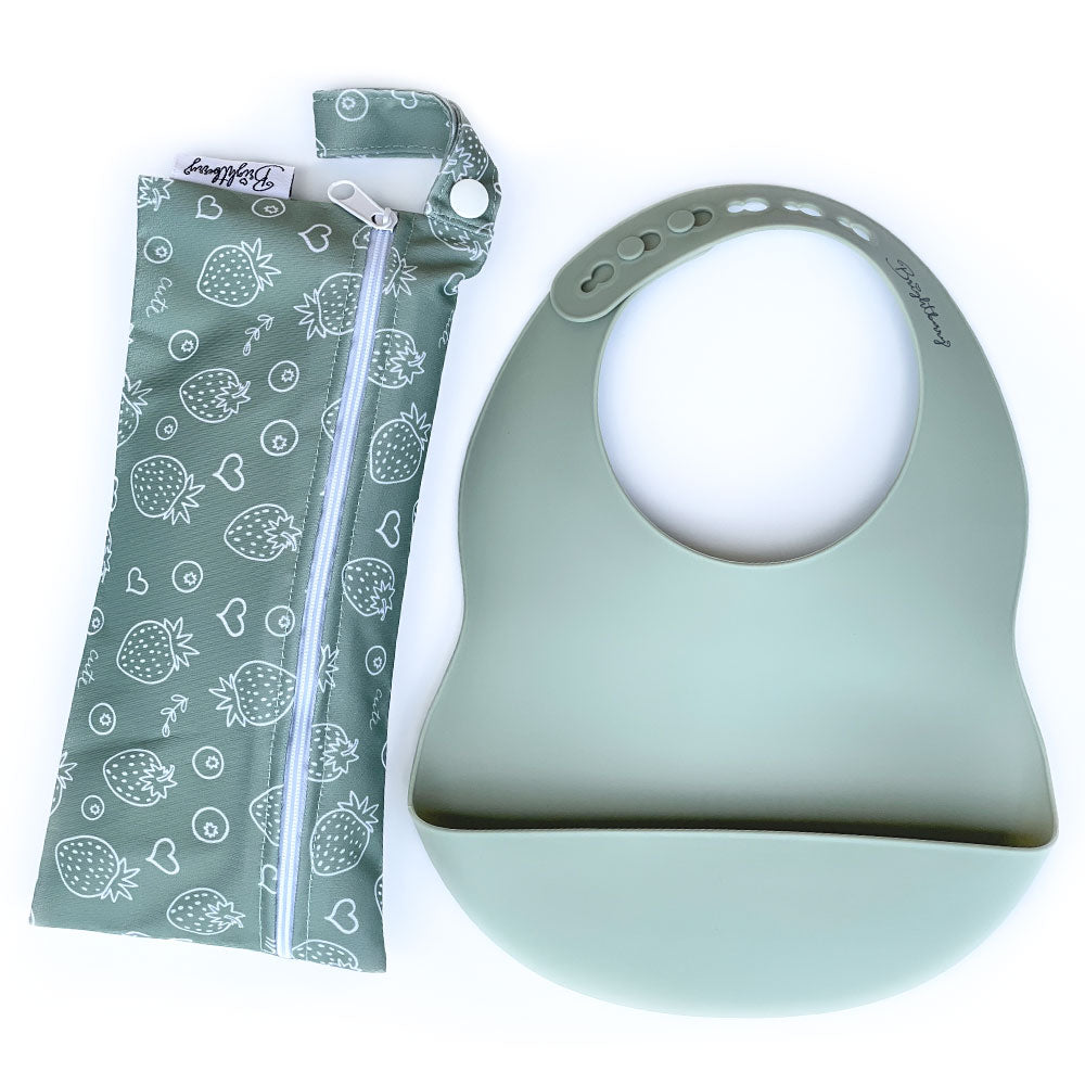 silicone bib in sage colour with sustainable and reusable packaging storage bag